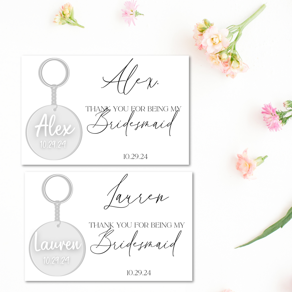 2 custom key chains in circles with alex and lauren written on them with custom proposal cards