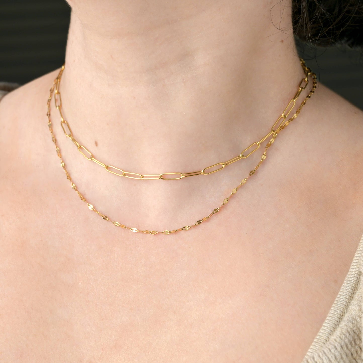 young woman wearing the gold minimalist choker