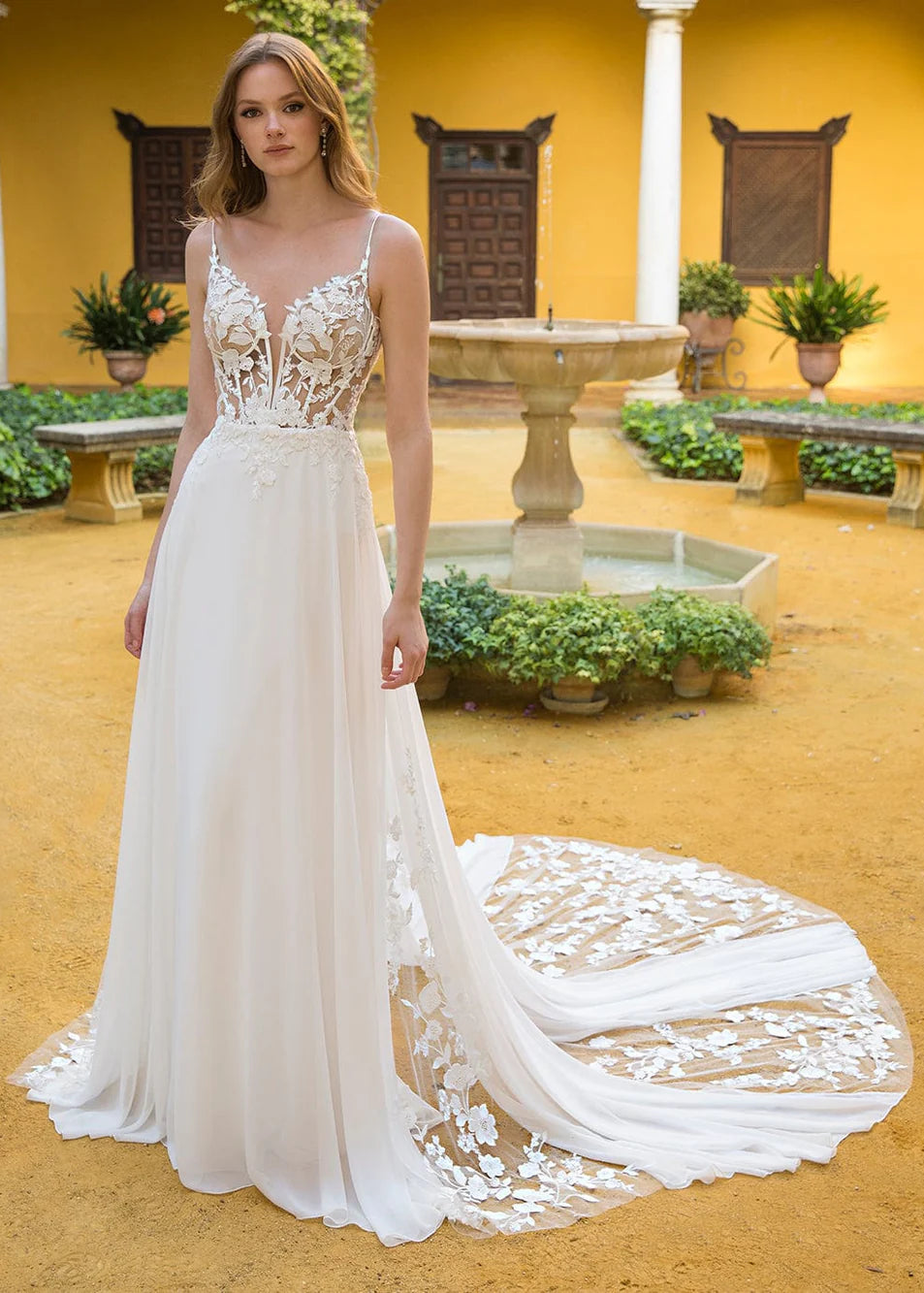 Feminine, floral, and show stopper, Parker's soft a line and gorgeous lace will make you fall in love.