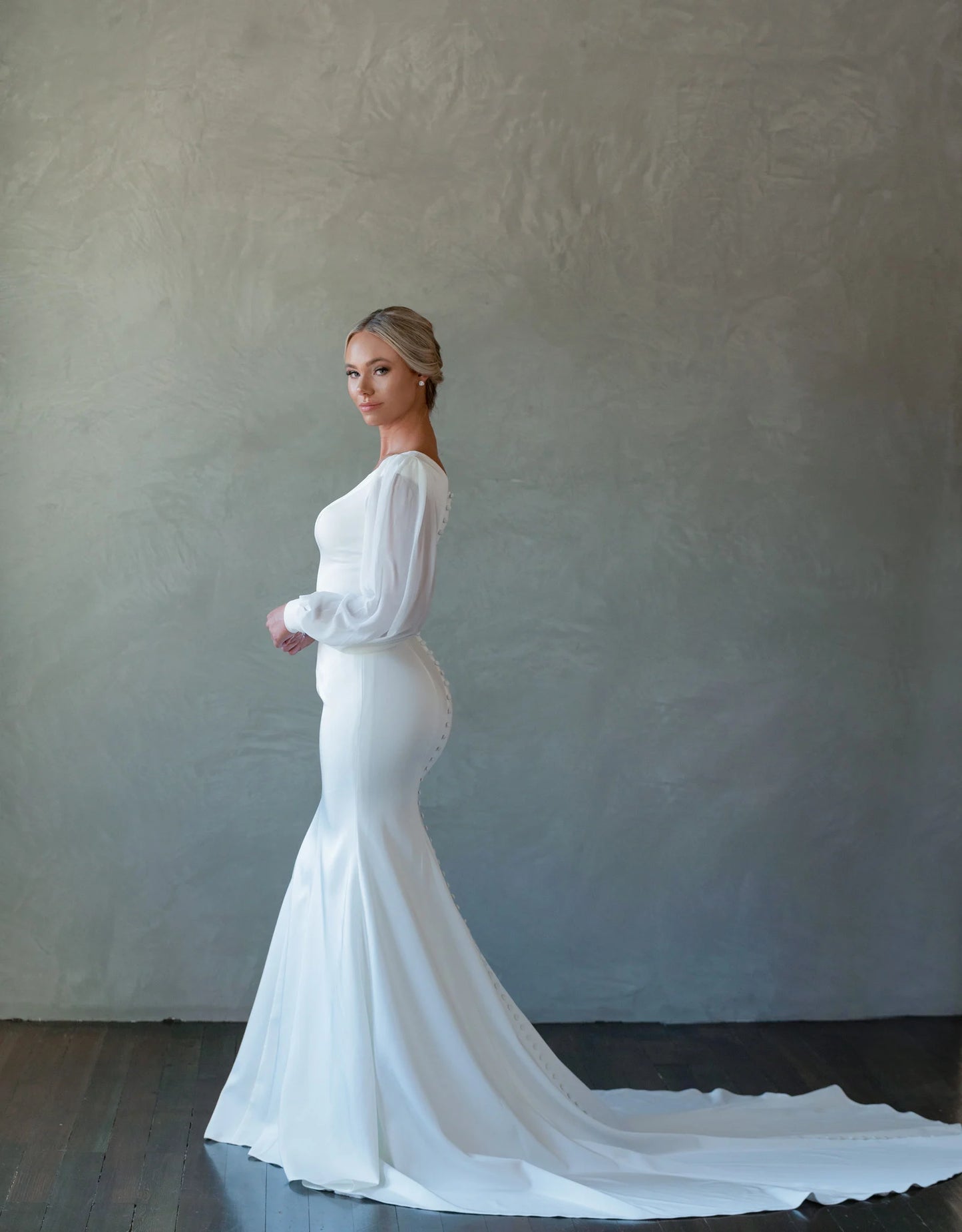 Full body side view of Amelia by The Modest Bride