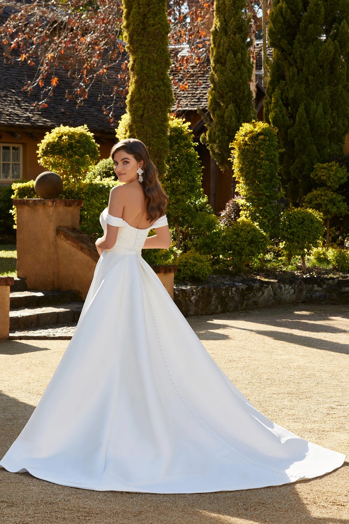 Back of Zendaya by Sophia Tolli is a fit and flare sweetheart wedding dress in mikado with a detachable overskirt at NKIN bridal boutique in Ottawa