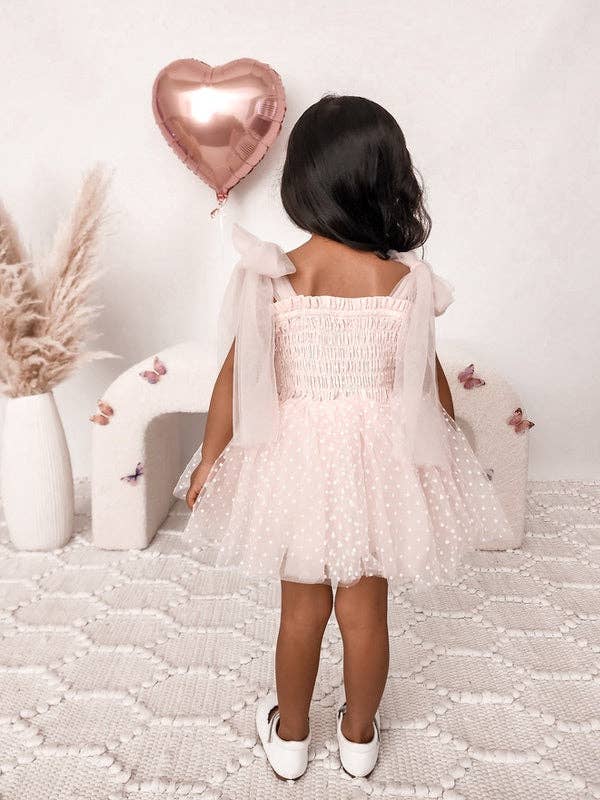 Full body back view of The "Poppy"