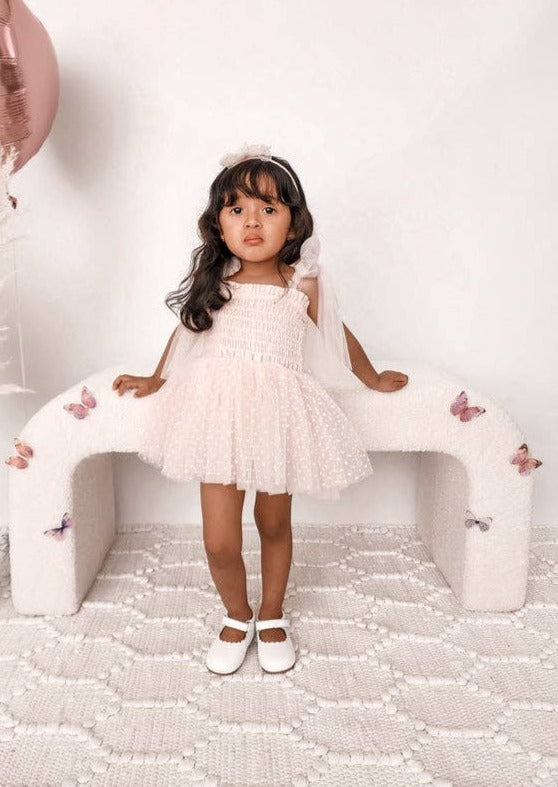 Full body front view of The "Poppy"