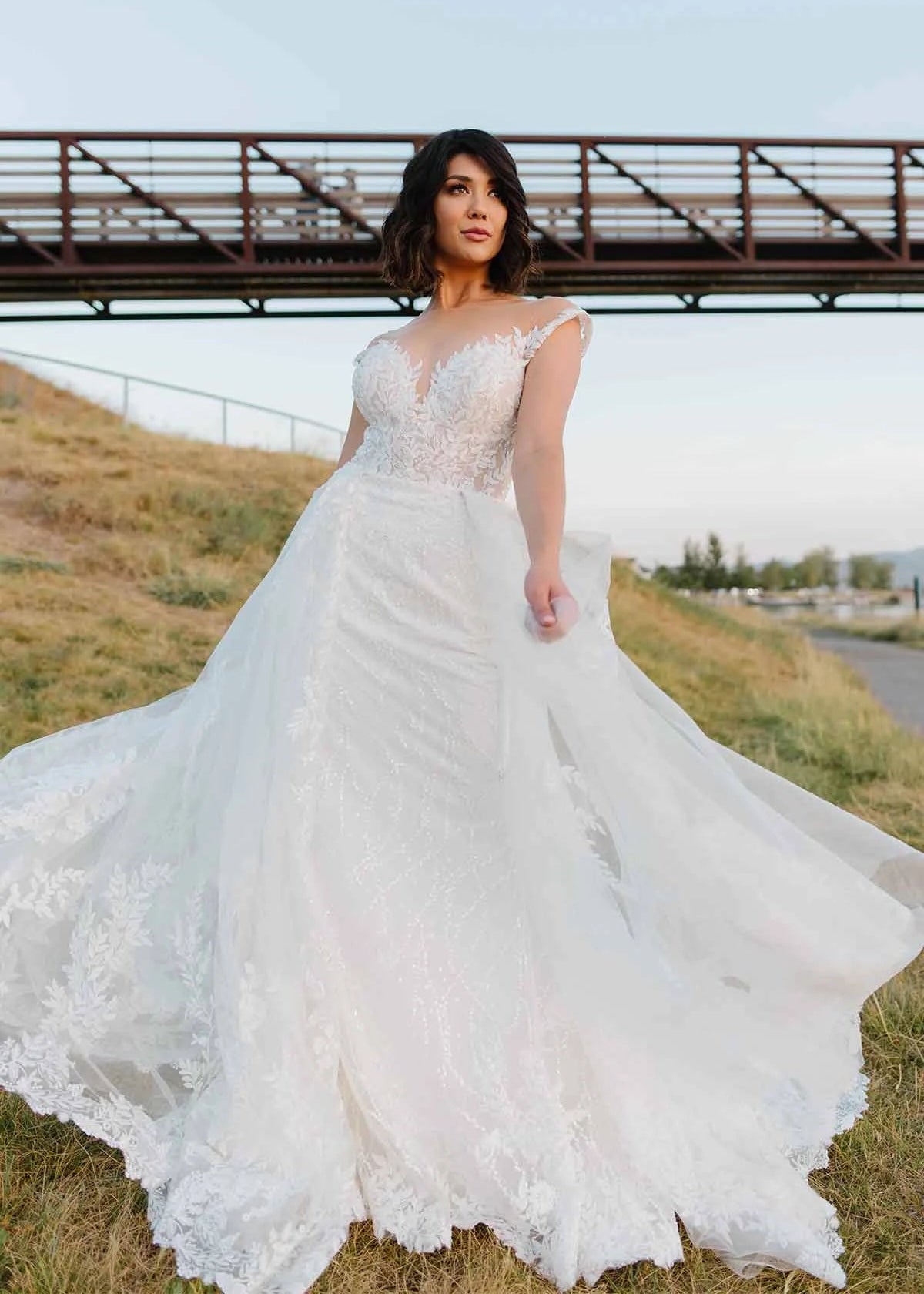 Model wearing ML1303 by Martina Liana - a full lace wedding dress