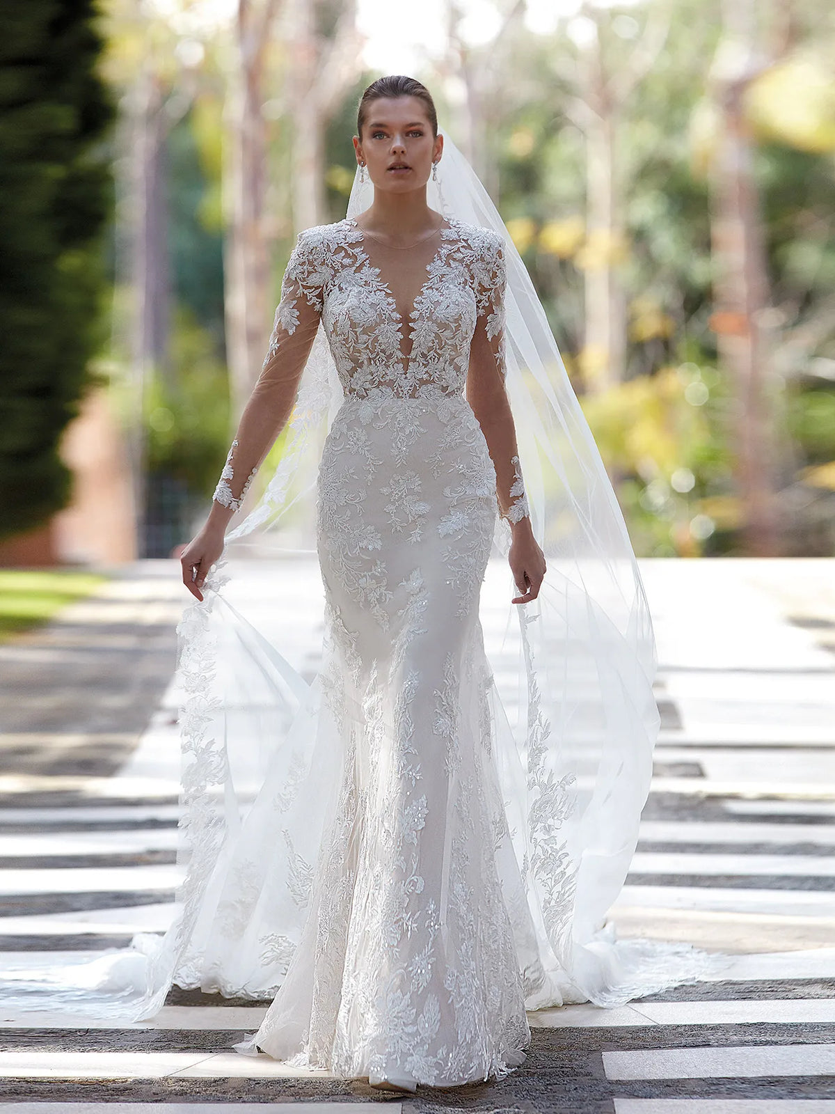 Long Sleeve wedding dress, modest mesh from Demetrios bridal. Available at NKIN