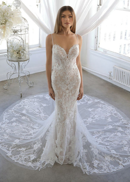 A stunning full lace fit and flare gown with delicate straps, a sweetheart neckline and a jaw dropping train.