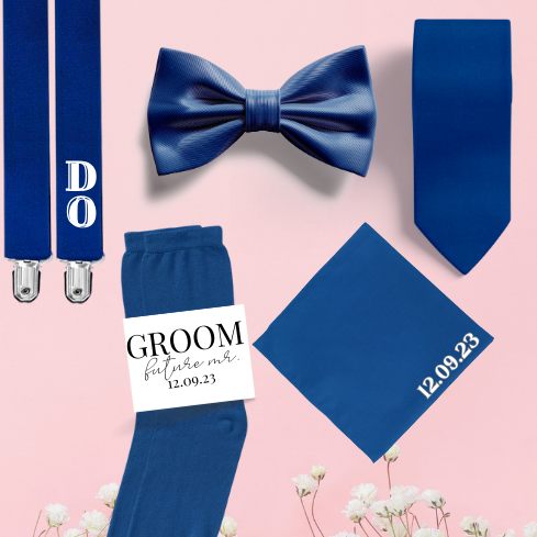 Custom groomsmen set in royal with a necktie, embroidered handkerchief, custom labelled socks, bowtie and embroidered suspenders