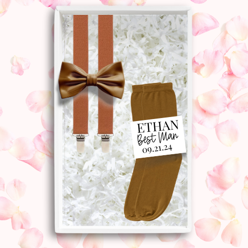Custom groomsmen set in roasted pecan with a bowtie, suspenders, and socks with a customized label