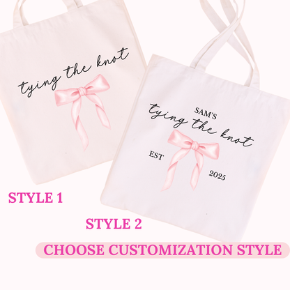 2 white tote bags with pink bows