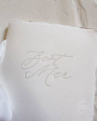 Picture of a white vow book with 