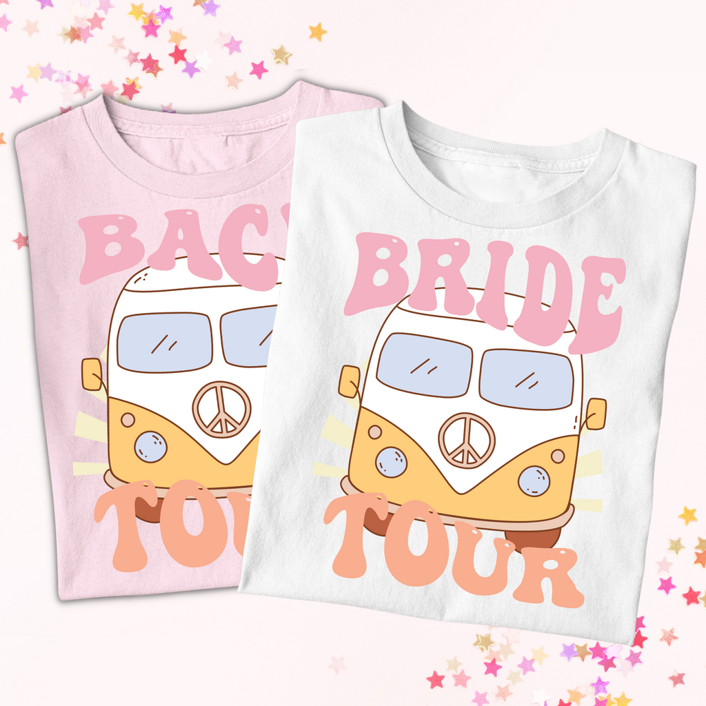 Pink shirt with "bach tour" and white shirt with"bride tour" written on with a vintage bus