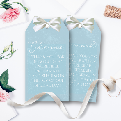 2 blue tags with “Shannon” and “hanna” written and a custom message