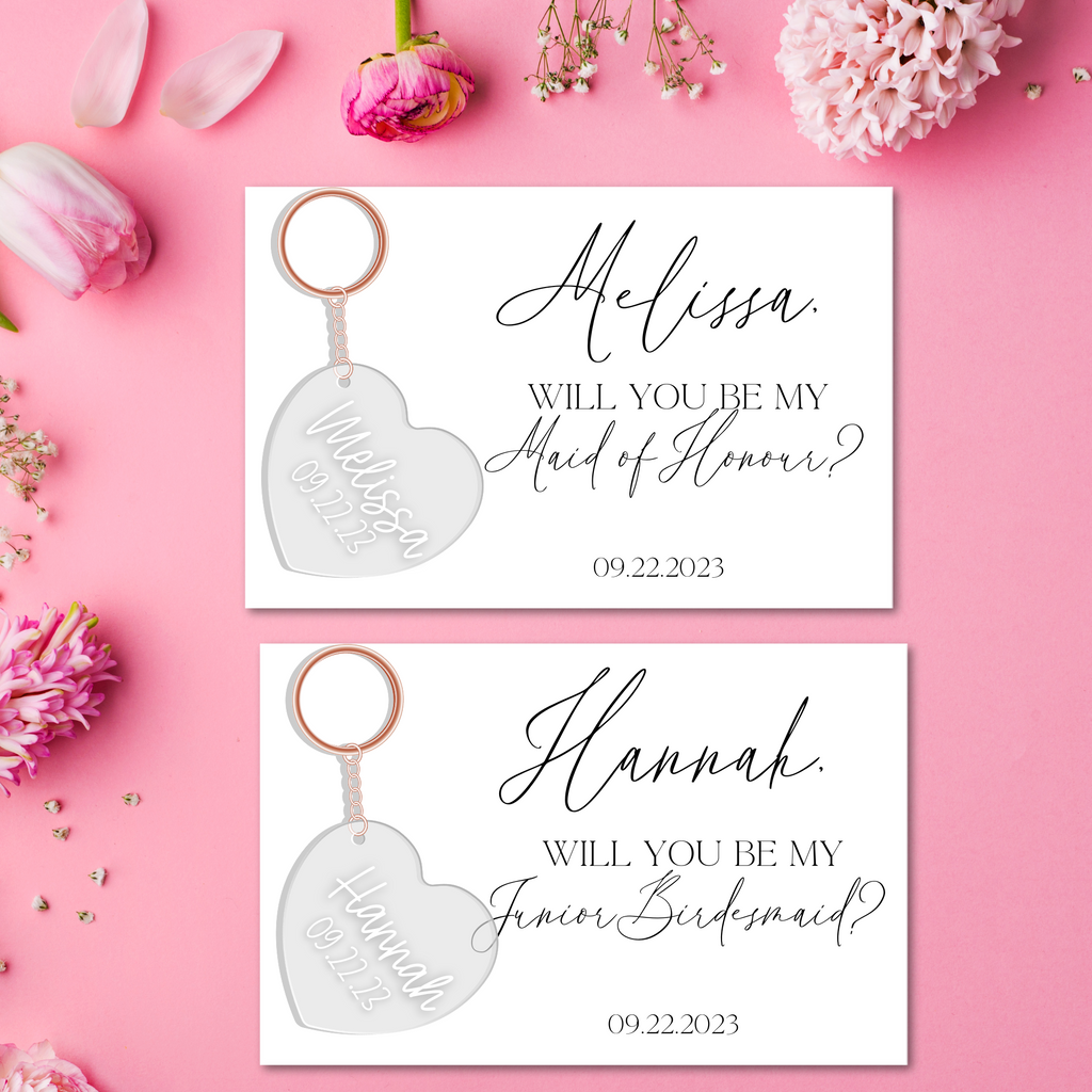 2 custom key chains in hearts with melissa and hanna written on them with custom proposal cards