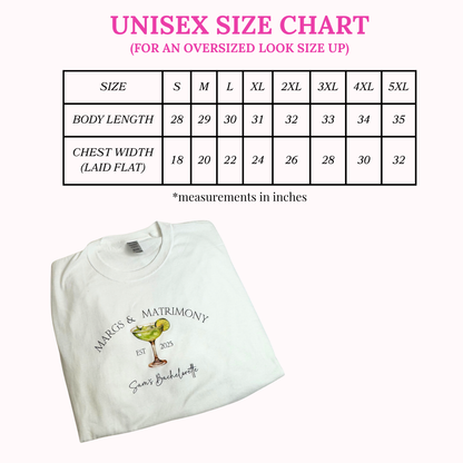 Folded white t-shirt with 'Margs & Matrimony' design and size chart on a white background