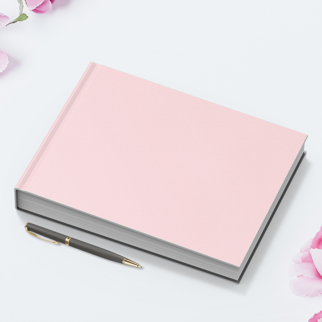 Our hardcover pink guestbook with a pen