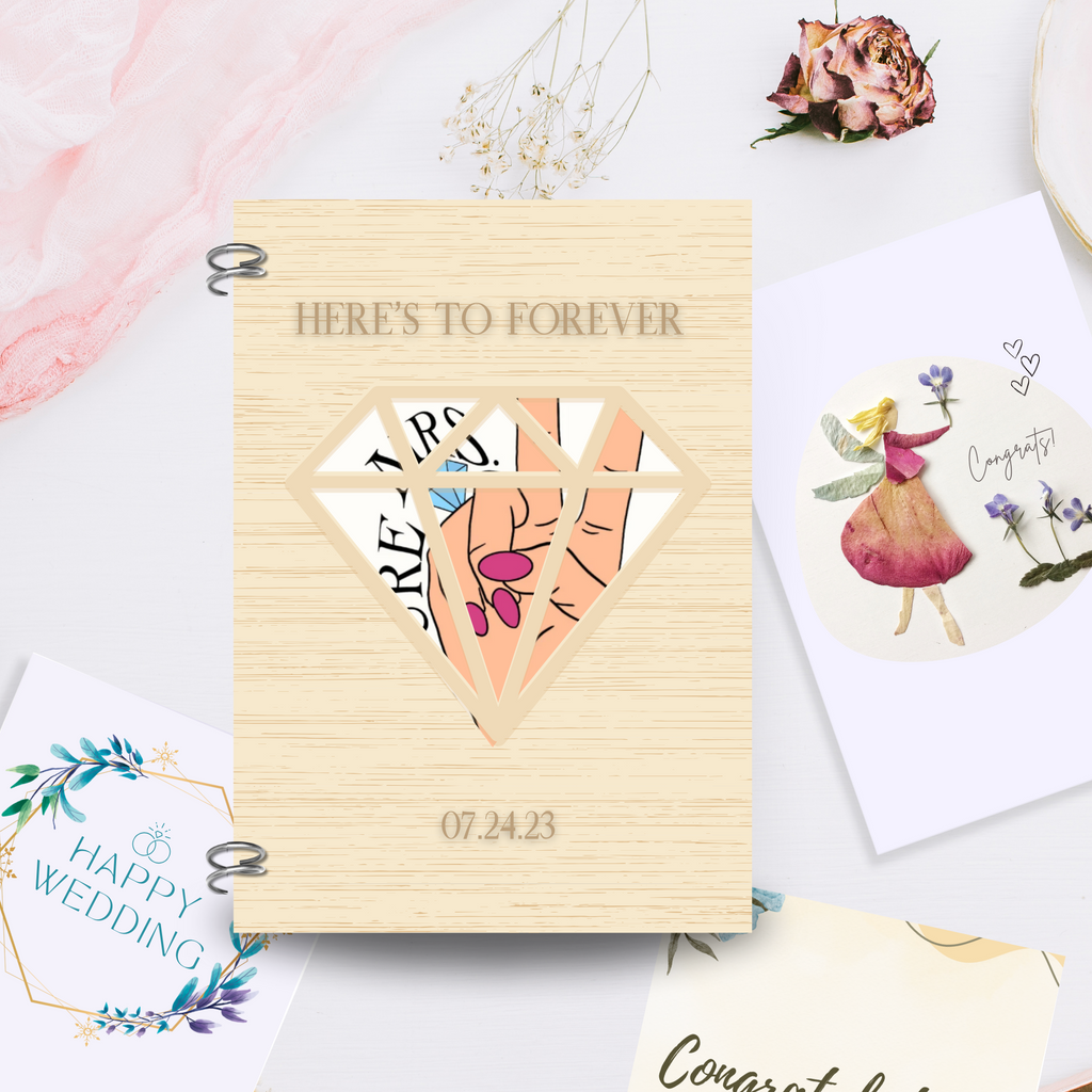 Wooden notebook with "abby + david, 10.21.2024"engraved with a diamond cut out and "future mrs" background