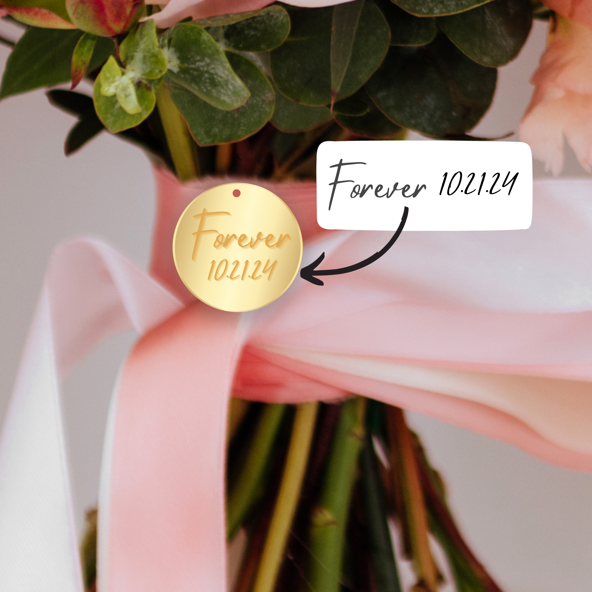 A bouquet with a gold circular charm that says 
