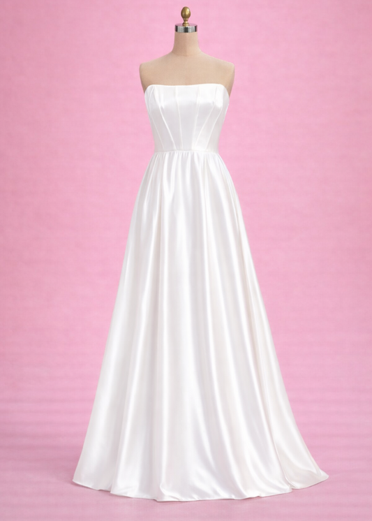 Belize is a classic beauty. She has a straight neckline, structured bodice, and super simple flowing a-line skirt.