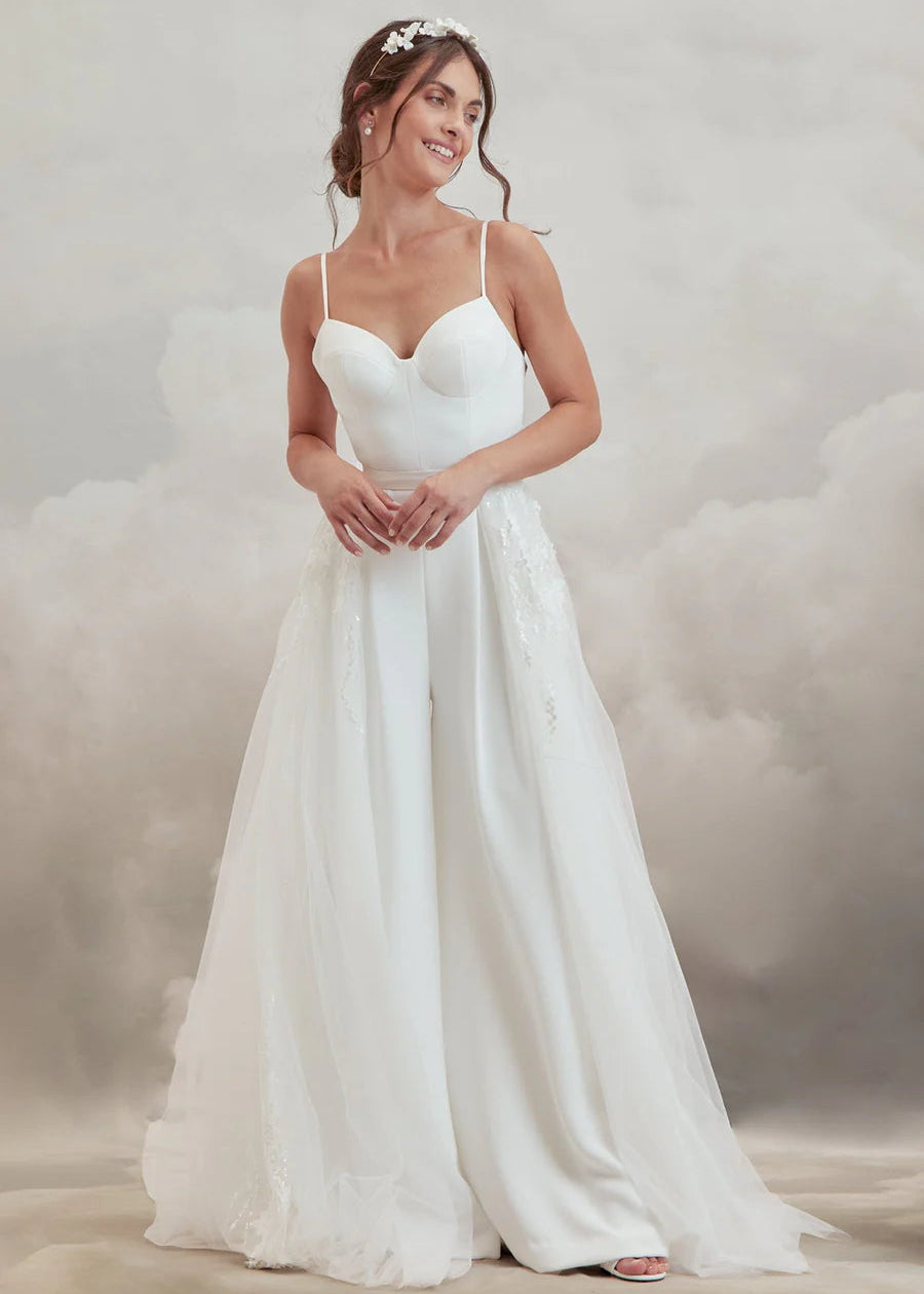 Woman wearing the begonia detachable skirt for wedding dresses