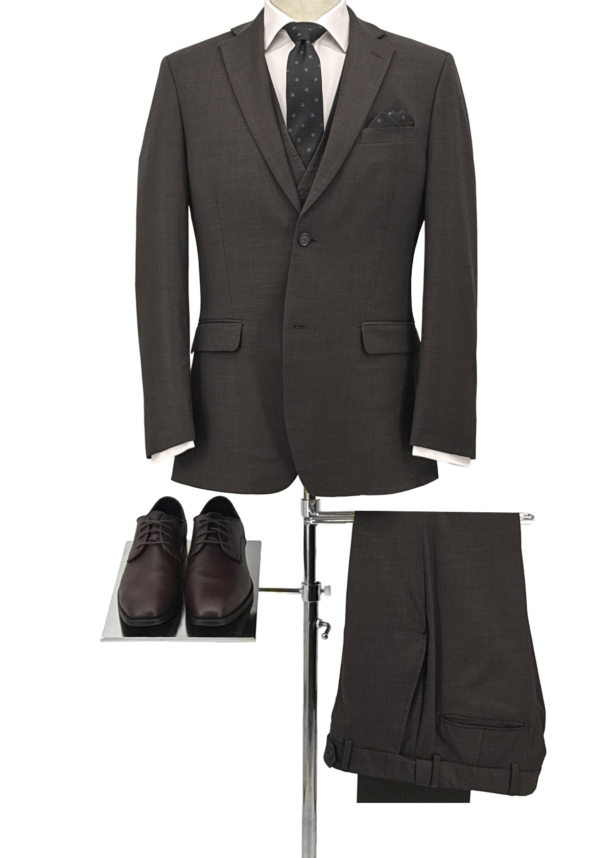 Brown suit with shoes and pants on a white background
