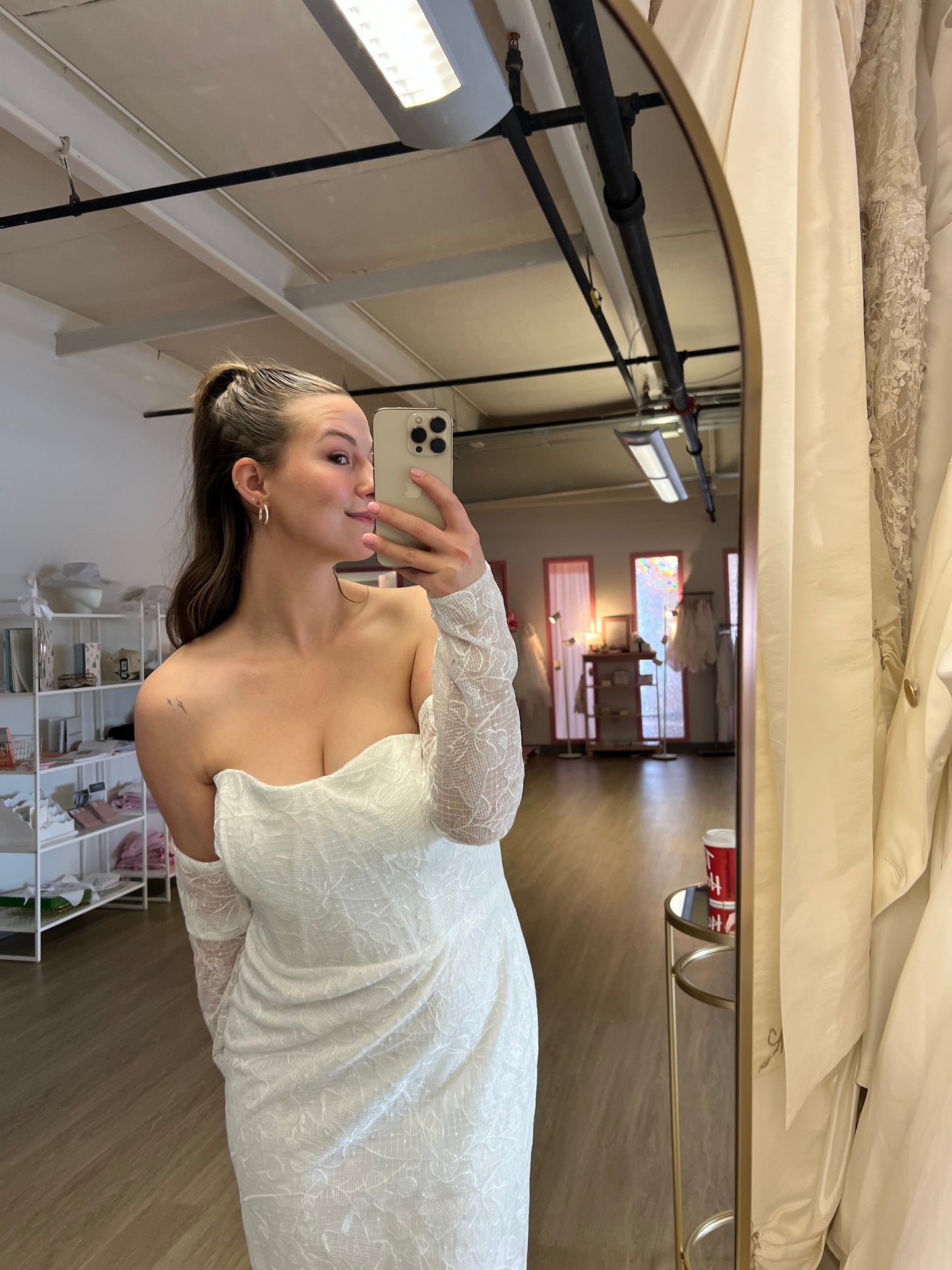 Abby wearing the Elvira wedding gown, lace square neck with detachable sleeves