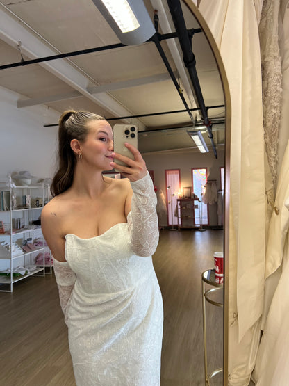 Abby wearing the Elvira wedding gown, lace square neck with detachable sleeves