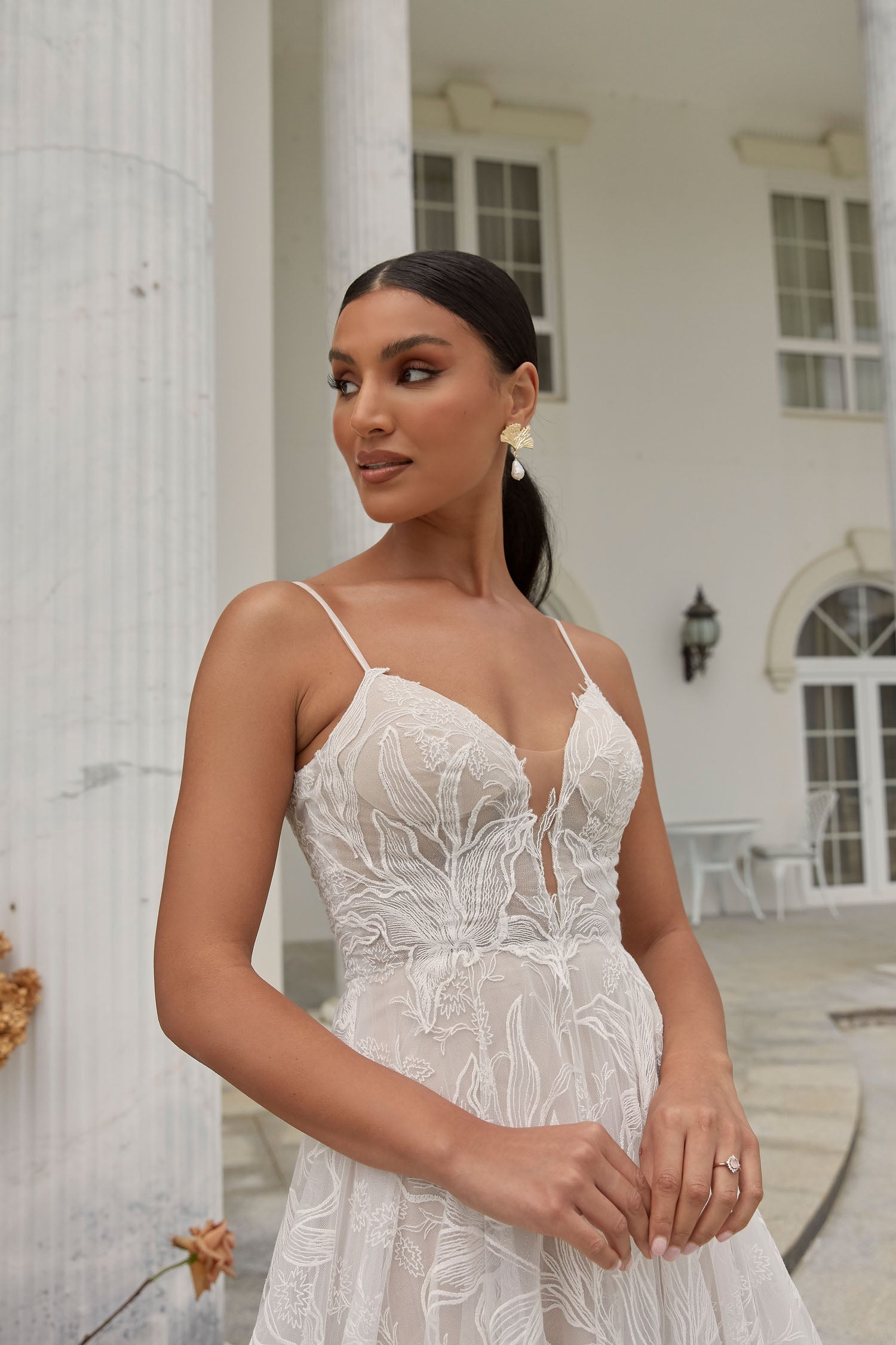 FULL BODY VIEW OF DUNE, A BOHO INSPIRED A LINE WITH DELICATE STRAPS AND A PLUNGING V NECK