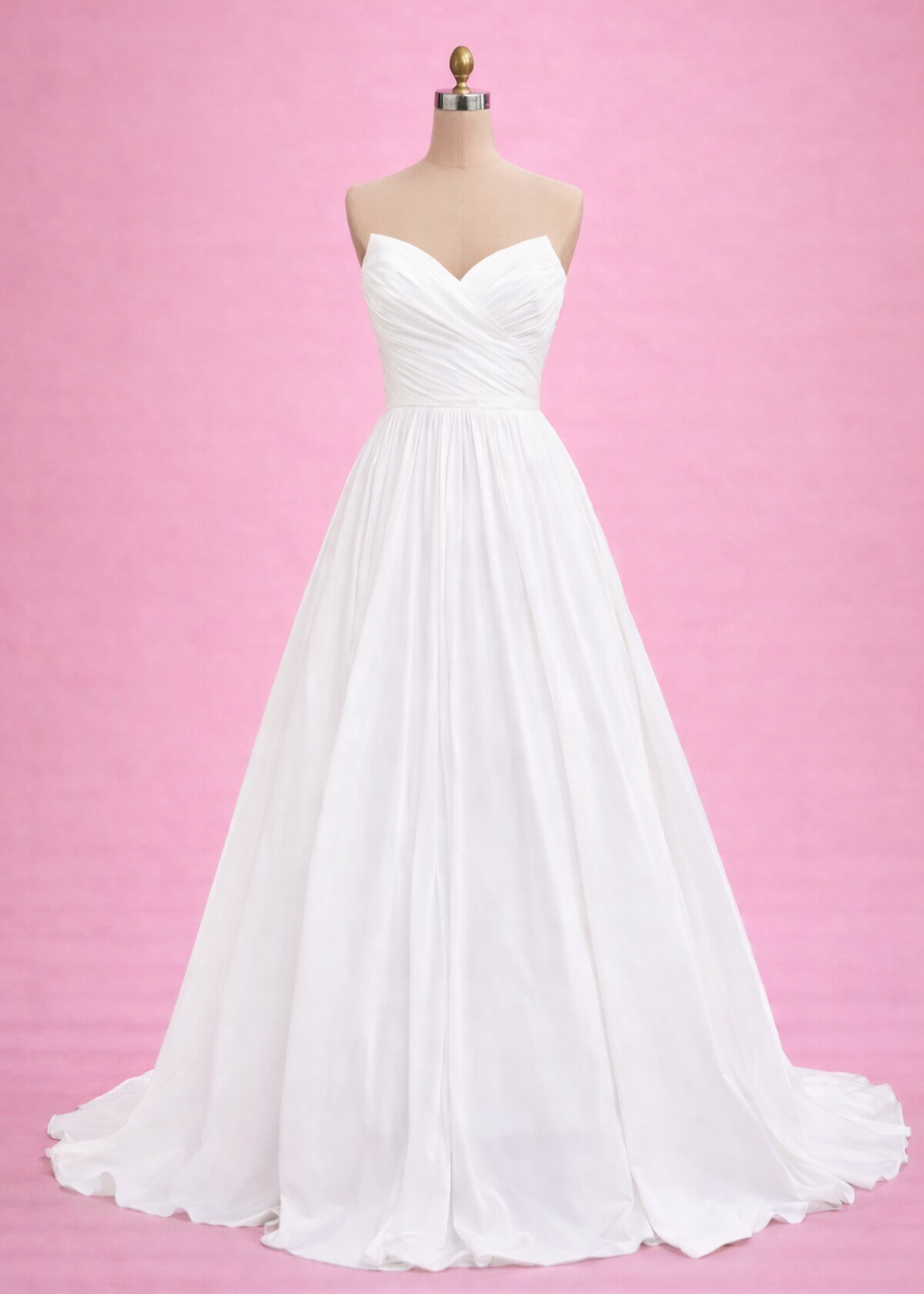 A classic a-line silhouette with a sharpened sweetheart neckline and snatching waistline.