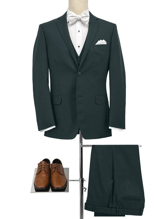 Green suit with white shirt, bow tie, and brown shoes on a white background