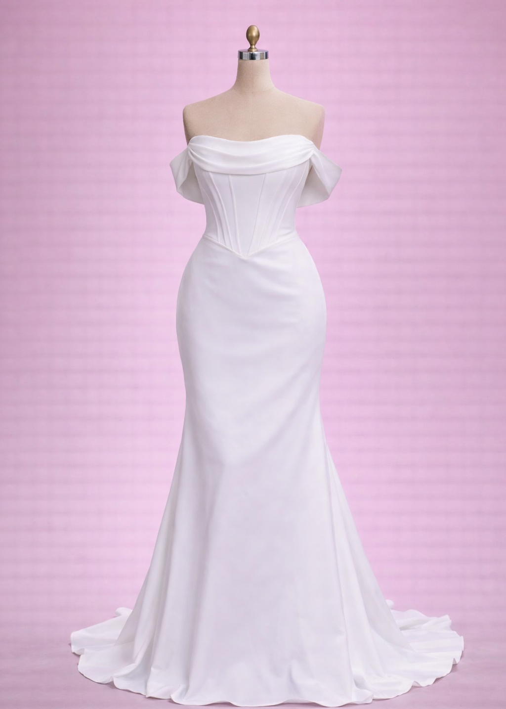 A stunning satin back crepe fitted gown with corseted bodice and baby basque waist.