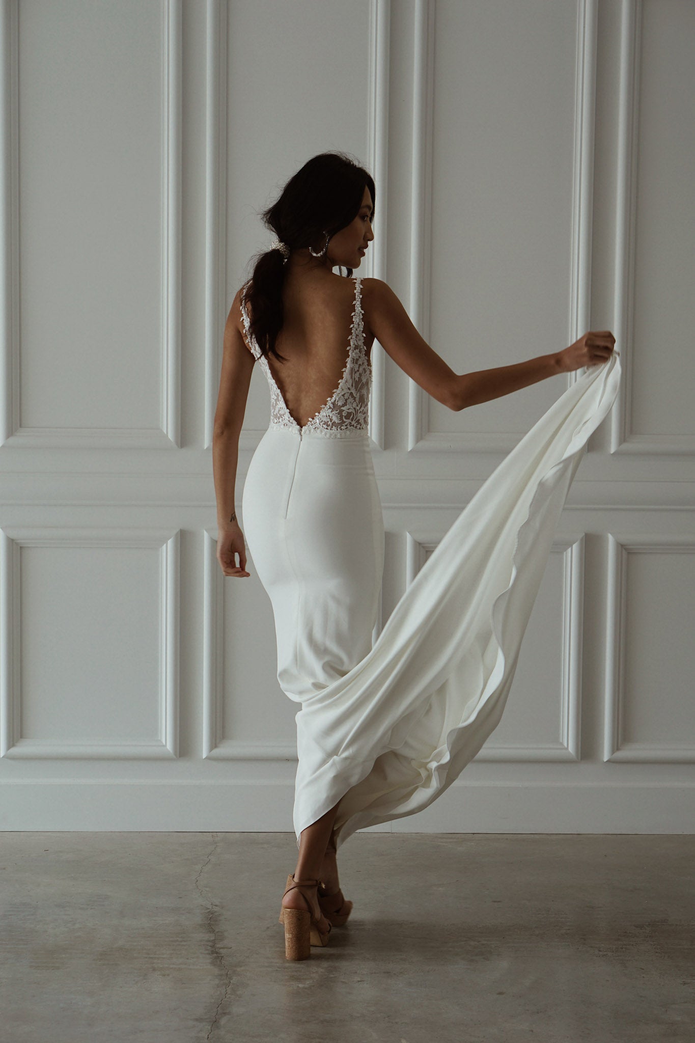 Full body back view of tommy crepe by made with love