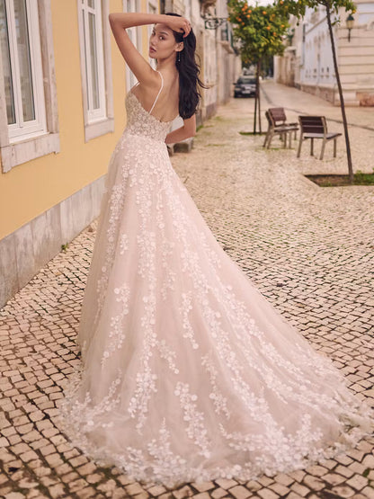 Sequin lace motifs over sparkle tulle
Sheer organza lined bodice
Plunging V-neckline
Deep sheer organza lined back bodice
Beaded spaghetti straps
Covered button over zipper closure