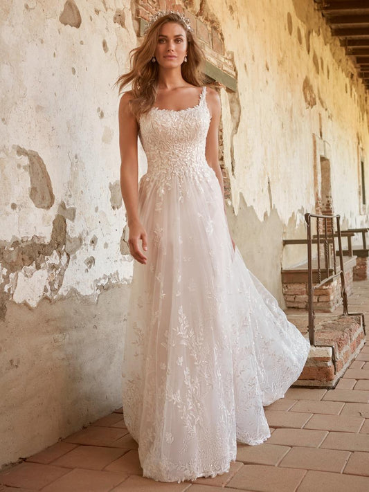light pink a-line fairytale wedding gown at Never Knew I Needed Shop