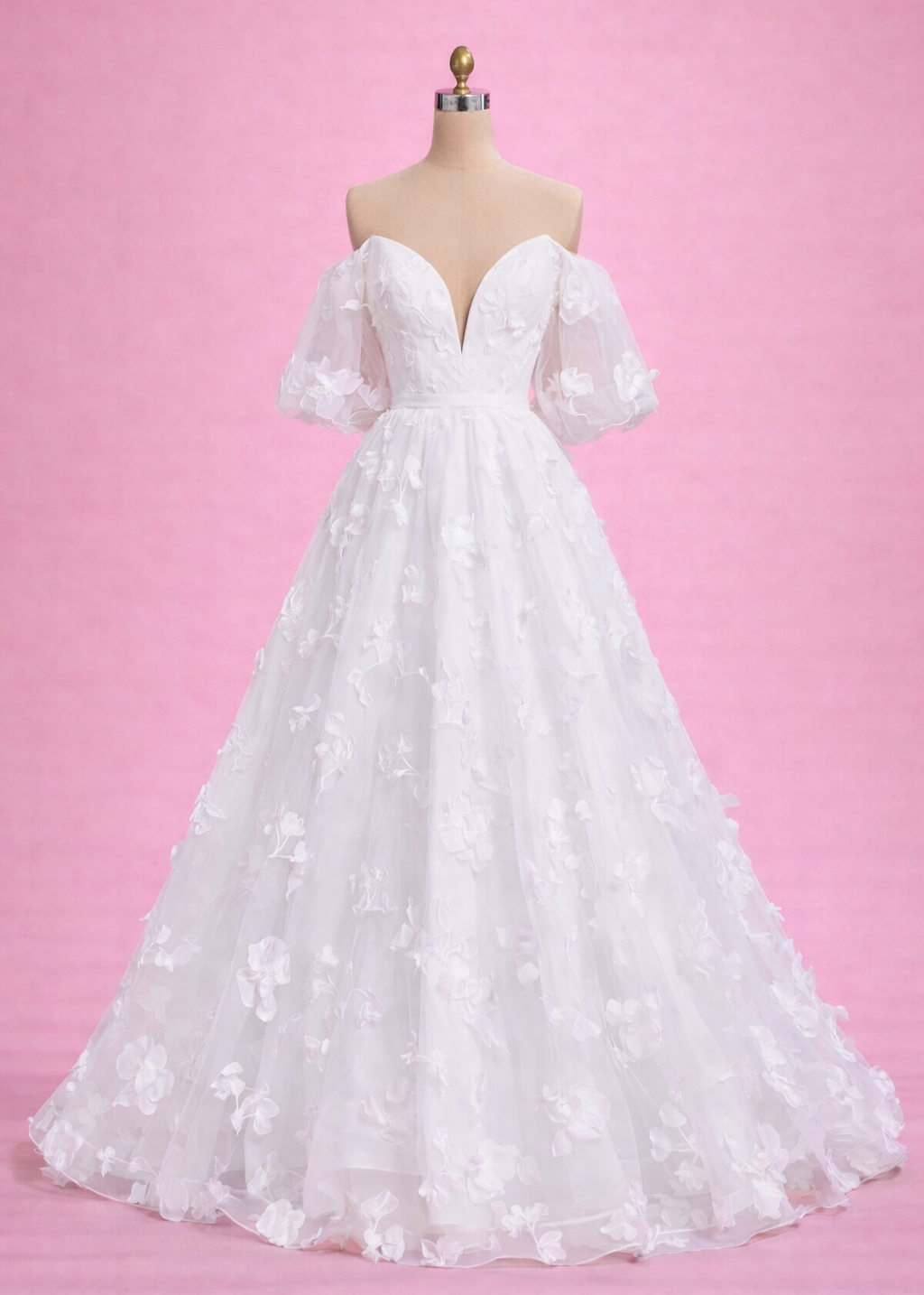 Marigold is everything you want your dress to be! Whimsical with it's 3D flowers, chic with it's puffy sleeves, and sultry with it's plunging neckline.