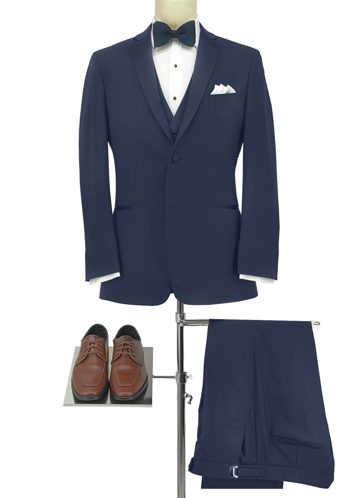 Navy jacket, pant and bowtie with white pocket square and round tan shoes