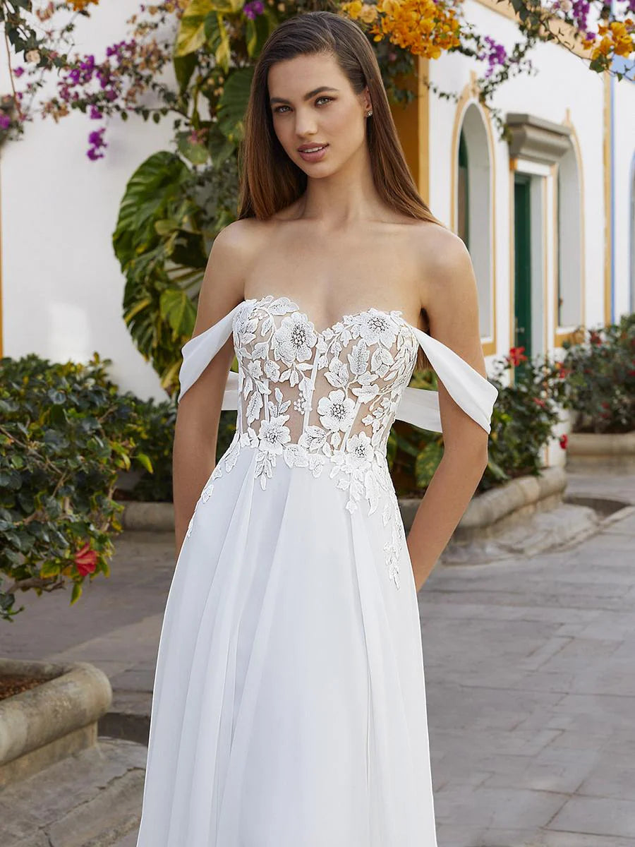 Sweet and timeless, this elegant floral a-line gown is the perfect romantic dress.