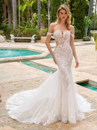 Sweetheart fit and flare mermaid wedding dress with an open back available at Never Knew I Needed in ottawa