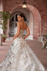 Model waring D3941 by Essence of Australia - strapless silver ball gown wedding dress with a high slit full body back view