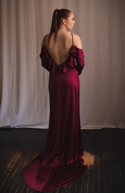 Woman wearing an off the shoulder red dress