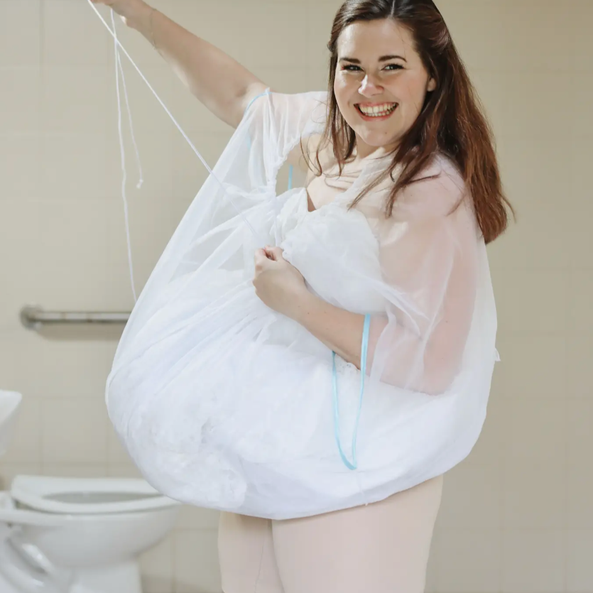 Woman pulling up the Bridal Buddy
