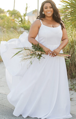 Woman wearing a plain wedding dress in white