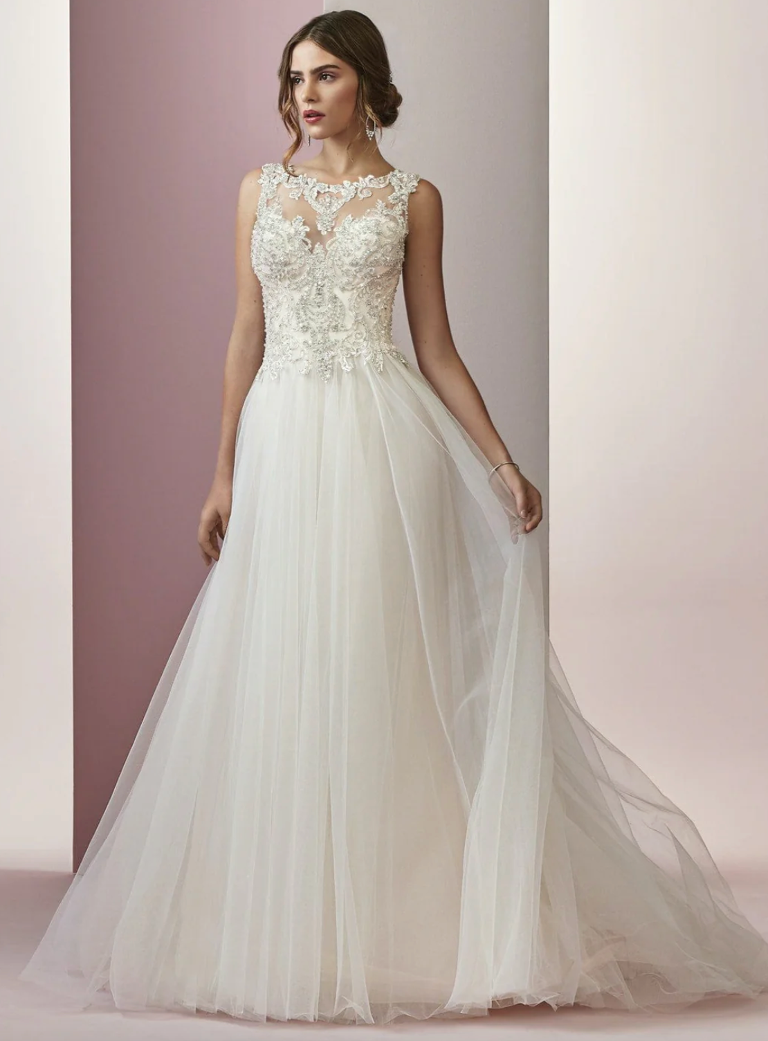 Woman wearing a halter neck a line wedding dress - front view