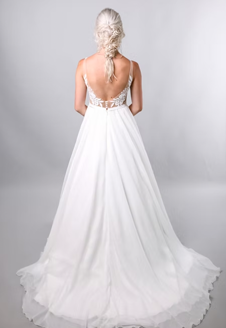 Meet Hailsey, a classic a-line with a beautifully accentuated neckline - full body back view
