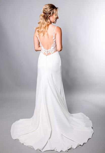 Meet Andrea, a non-fuss breath of fresh air fit and flare gown with hints of lace. - full body back view