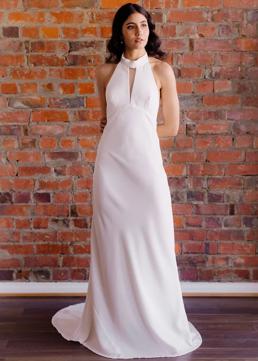 Stun everyone with this sexy halter style. Soft crepe fabric hugs and flows in all the right places. You will be the height of sophistication in this beautiful dress.&nbsp;