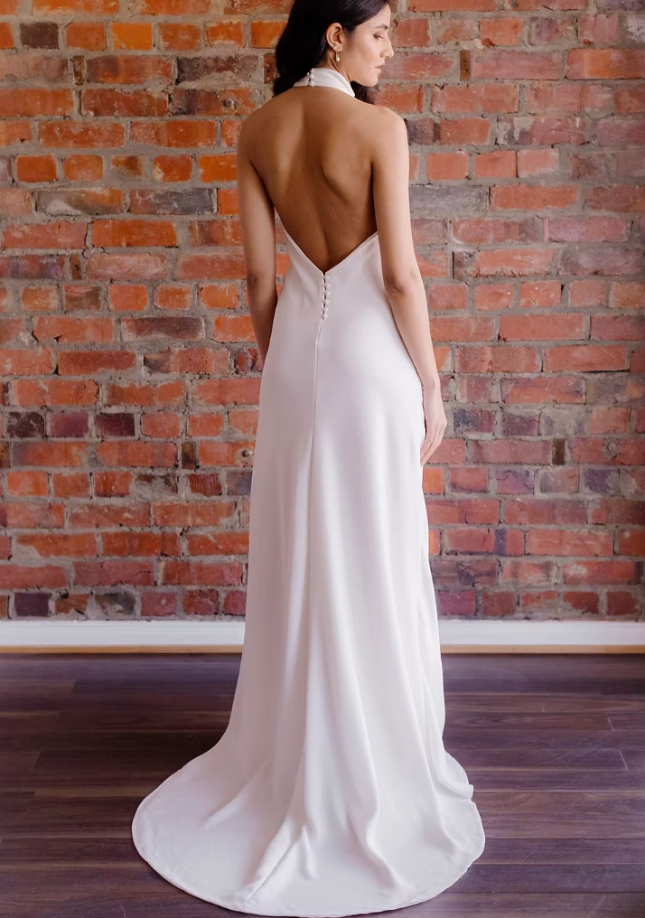Stun everyone with this sexy halter style. Soft crepe fabric hugs and flows in all the right places. You will be the height of sophistication in this beautiful dress.&nbsp;