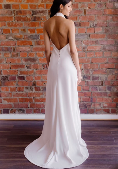 Stun everyone with this sexy halter style. Soft crepe fabric hugs and flows in all the right places. You will be the height of sophistication in this beautiful dress.&nbsp;