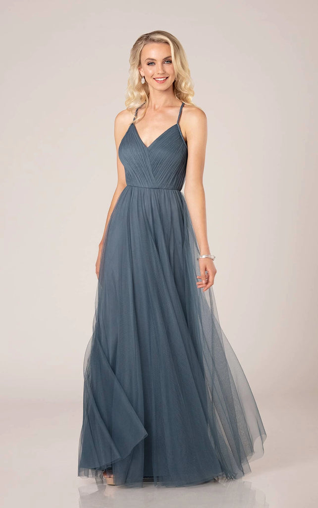 A beachy boho style unlike anything else! If you're seeking a sea-inspired statement, this relaxed silhouette from Sorella Vita is calling your name. The Soft English Net fabric sweeps across the bodice in a linear fashion, drawing the eye in toward the waist for a flattering effect. The layers of the weightless material fall gracefully over the waistline in gentle pleats, following into a frothy hem—perfect for catching a sea breeze. The braided tulle straps tie it all together—literally—as they gather two