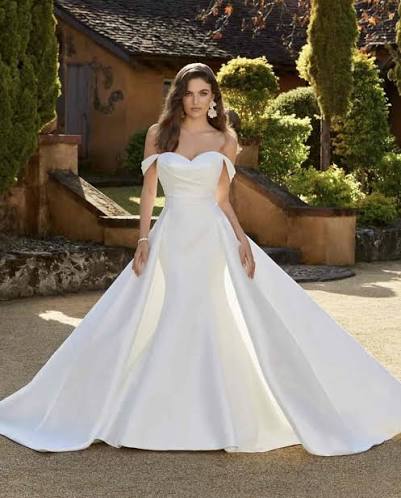 Zendaya by Sophia Tolli is a fit and flare sweetheart wedding dress in mikado with a detachable overskirt at NKIN bridal boutique in Ottawa
