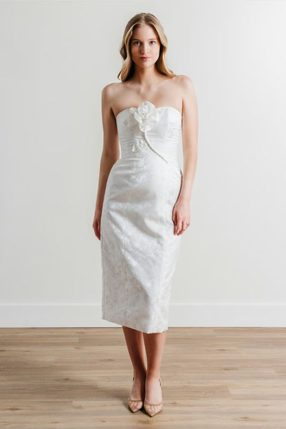 Sculptural and chic, Marc is a strapless midi crafted in textured lace jacquard with subtle 3D floral detailing. Elegant yet unexpected, she’s the definition of elevated minimalism.